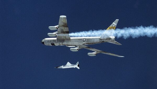 This 02 June 2001 image released late 04 June by NASA shows the X-43A hypersonic research aircraft and the Pegassus rocket motor being dropped by NASA's B-52B aircraft from the Dryden Research Center at Edwards Air Force Base in California - Sputnik International