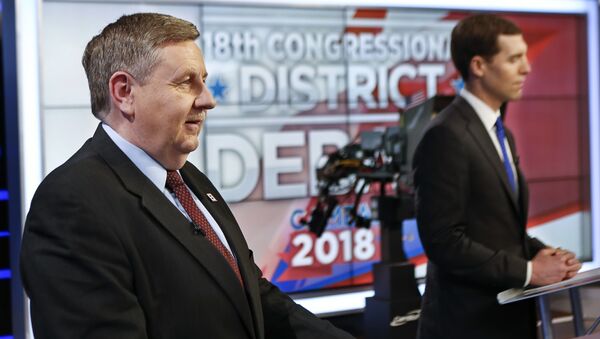 Republican Rick Saccone, left, and Democrat Connor Lamb before the taping of their first debate in the special election in the Pa., 18th Congressional District at the KDKA TV studios, Monday, Feb. 19, 2018, in Pittsburgh. - Sputnik International