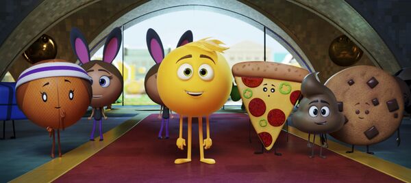 This file image released by Sony Pictures shows Gene, voiced by T.J. Miller, center, in Columbia Pictures and Sony Pictures Animation's The Emoji Movie. - Sputnik International