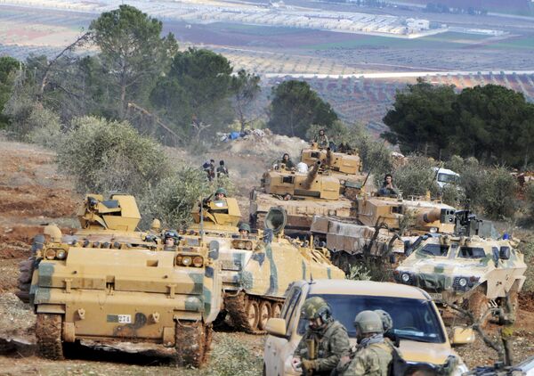 Turkish troops take control of Bursayah hill, which separates the Kurdish-held enclave of Afrin from the Turkey-controlled town of Azaz, Syria, Sunday, Jan. 28, 2018 Turkish troops take control of Bursayah hill, which separates the Kurdish-held enclave of Afrin from the Turkey-controlled town of Azaz, Syria, Sunday, Jan. 28, 2018 - Sputnik International