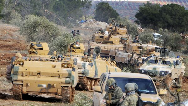 Turkish troops take control of Bursayah hill, which separates the Kurdish-held enclave of Afrin from the Turkey-controlled town of Azaz, Syria, Sunday, Jan. 28, 2018 - Sputnik International