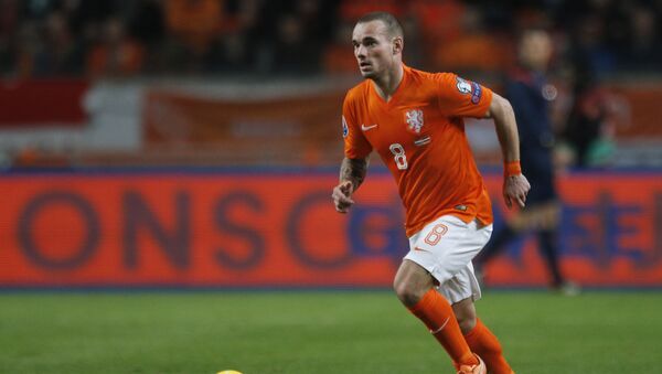 Netherlands' Wesley Sneijder passes the ball during the Euro 2016 group A qualifying round soccer match between the Netherlands and Latvia at ArenA stadium in Amsterdam, Netherlands, Sunday, Nov. 16, 2014 - Sputnik International