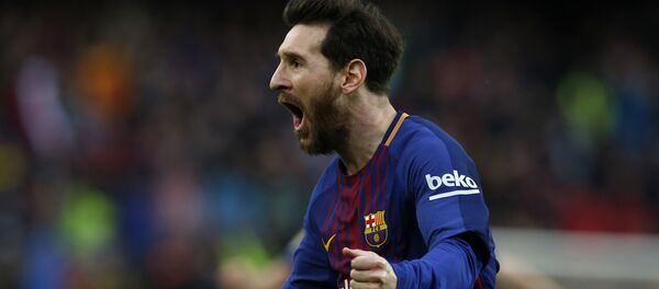 FC Barcelona's Lionel Messi reacts after scoring during the Spanish La Liga soccer match between FC Barcelona and Atletico Madrid at the Camp Nou stadium in Barcelona, Spain, Sunday, March 4, 2018 FC Barcelona's Lionel Messi reacts after scoring during the Spanish La Liga soccer match between FC Barcelona and Atletico Madrid at the Camp Nou stadium in Barcelona, Spain, Sunday, March 4, 2018 - Sputnik International