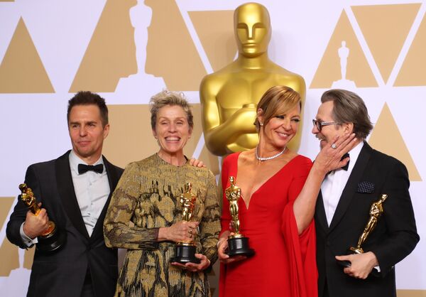 90th Academy Awards - Oscars Backstage - Hollywood, California, U.S., 04/03/2018 - Oscar winners Sam Rockwell, Frances McDormand, Allison Janney and Gary Oldman (L to R) pose backstage 90th Academy Awards - Oscars Backstage - Hollywood, California, U.S., 04/03/2018 - Oscar winners Sam Rockwell, Frances McDormand, Allison Janney and Gary Oldman (L to R) pose backstage - Sputnik International