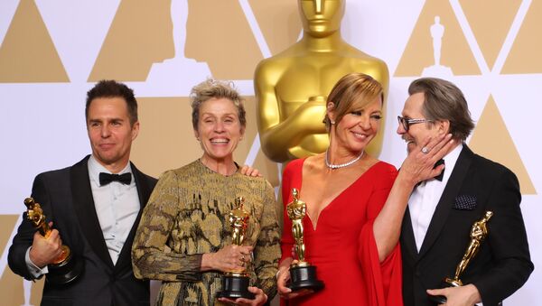 90th Academy Awards - Oscars Backstage - Hollywood, California, U.S., 04/03/2018 - Oscar winners Sam Rockwell, Frances McDormand, Allison Janney and Gary Oldman (L to R) pose backstage - Sputnik International