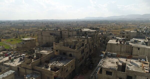 A humanitarian corridor between Damascus and East Ghouta near the Al Wafidin refugee camp in Syria A humanitarian corridor between Damascus and East Ghouta near the Al Wafidin refugee camp in Syria - Sputnik International