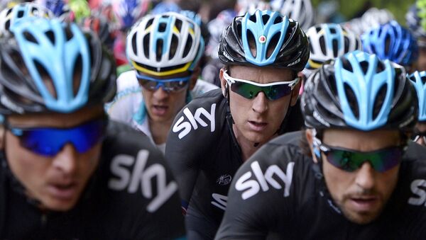 In this Tuesday, May 14, 2013 file photo Britain's Bradley Wiggins, second from right, pedals during the the 10th stage of the Giro d'Italia, Tour of Italy cycling race, from Cordenons to Altopiano del Montasio. - Sputnik International