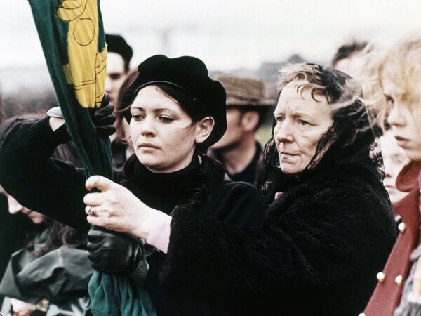 A young girl member of the Irish Republican Army (IRA) carries a flag during the movement’s parade to the Milltown Cemetery, where the IRA buries its dead, in Belfast, Northern Ireland on April 2, 1972. A young girl member of the Irish Republican Army (IRA) carries a flag during the movement’s parade to the Milltown Cemetery, where the IRA buries its dead, in Belfast, Northern Ireland on April 2, 1972. - Sputnik International