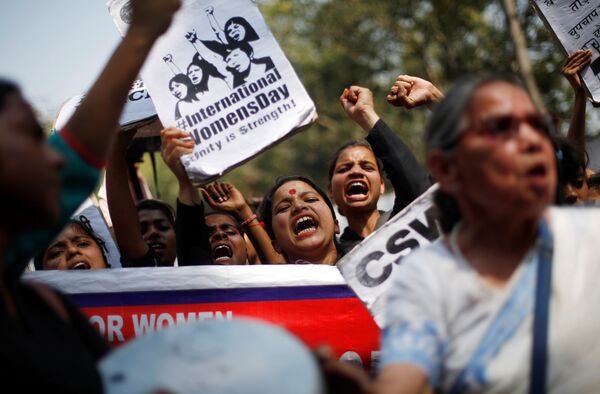 Girls shout slogans during a protest demanding equal rights for women on the occasion of International Women’s Day in New Delhi, India, March 8, 2018 - Sputnik International