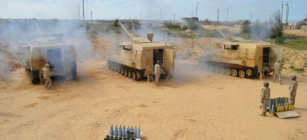 Egyptian Army's soldiers fire artilleries during a launch of a major assault against militants in the troubled northern part of the Sinai peninsula in Al Arish, Egypt, in this undated handout picture made available by the Ministry of Defence, February 27, 2018 - Sputnik International