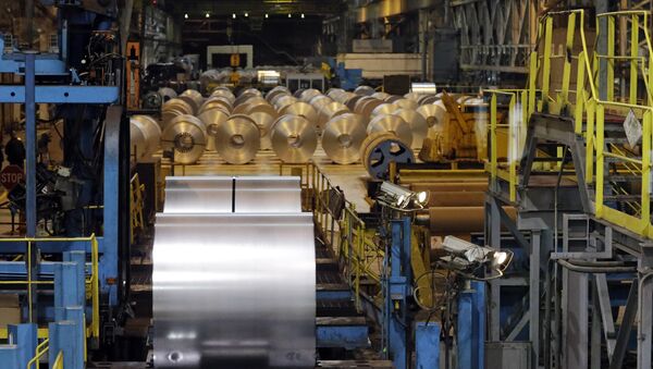 Finished galvanized steel coils await roll of the hot dip galvanizing line at ArcelorMittal Steel in Cuyahoga Heights, Ohio Friday, Feb. 15, 2013 - Sputnik International