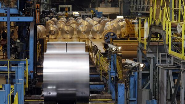 Finished galvanized steel coils await roll of the hot dip galvanizing line at ArcelorMittal Steel in Cuyahoga Heights, Ohio Friday, Feb. 15, 2013 - Sputnik International
