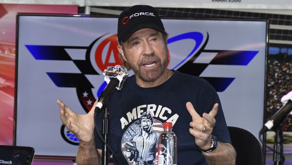 Chuck Norris speaks to reporters during a media availability before the NASCAR Sprint Cup Series auto race at Texas Motor Speedway in Fort Worth, Texas, Sunday, Nov. 6, 2016 - Sputnik International