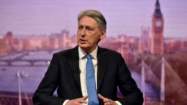 Britain's Chancellor of the Exchequer Philip Hammond attends the Marr Show at the BBC in London, March 11, 2018 - Sputnik International