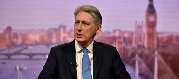Britain's Chancellor of the Exchequer Philip Hammond attends the Marr Show at the BBC in London, March 11, 2018 - Sputnik International