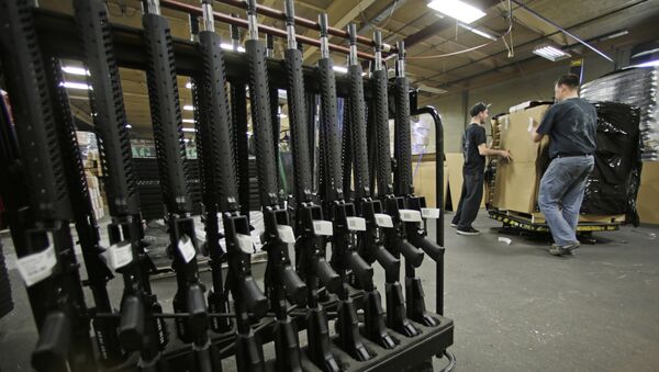 In this April 10, 2013 file photo, newly made AR-15 rifles stand in a rack at Stag Arms in New Britain, Conn. - Sputnik International