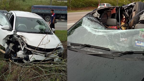 Lorry’s Runaway Tire Causes Near-Fatal Damage on Malaysian Highway - Sputnik International