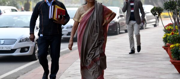 Indian defence minister Nirmala Sitharaman (C) walks after arriving for the winter session of Parliament in New Delhi on December 15, 2017 Indian defence minister Nirmala Sitharaman (C) walks after arriving for the winter session of Parliament in New Delhi on December 15, 2017 - Sputnik International