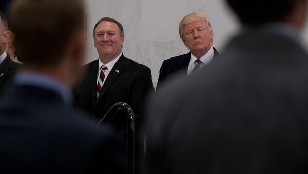 President Donald Trump, accompanied by CIA Director-designate Rep. Michael Pompeo, left, waits to speak at the Central Intelligence Agency in Langley, Va., Saturday, Jan. 21, 2017 - Sputnik International