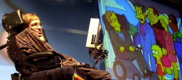 British physicist Stephen Hawking looks, on his screen, at an animated clipping of himself with cartoon characters from popular television serial 'The Simpsons', while addressing a public lecture on 'Science in the future', in Bombay Sunday, Jan. 14, 2001 - Sputnik International