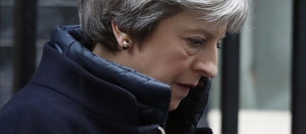 Britain's Prime Minister Theresa May leaves 10 Downing Street to attend the weekly Prime Minister's Questions session, in parliament in London, Wednesday, March 14, 2018 - Sputnik International