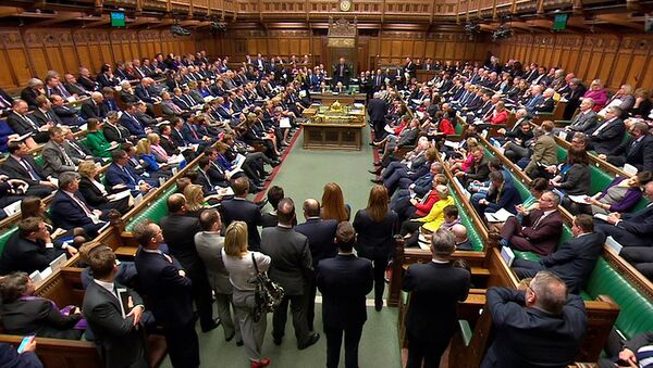 Britain's Prime Minister Theresa May addresses the House of Commons on her government's reaction to the poisoning of former Russian intelligence officer Sergei Skripal and his daughter Yulia in Salisbury, in London, March 14, 2018 - Sputnik International