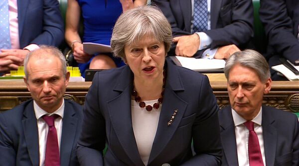 Britain's Prime Minister Theresa May addresses the House of Commons on her government's reaction to the poisoning of former Russian intelligence officer Sergei Skripal and his daughter Yulia in Salisbury, in London, March 14, 2018 Britain's Prime Minister Theresa May addresses the House of Commons on her government's reaction to the poisoning of former Russian intelligence officer Sergei Skripal and his daughter Yulia in Salisbury, in London, March 14, 2018 - Sputnik International