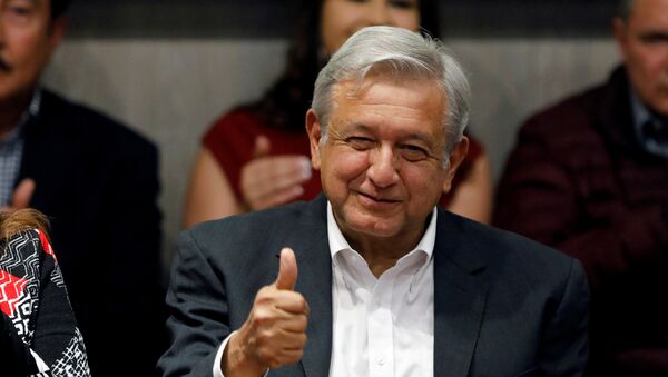 FILE PHOTO: Andres Manuel Lopez Obrador, presidential candidate of the National Regeneration Movement (MORENA) gives a thumbs up to members of Partido del Trabajo (Labor Party), in Mexico City, Mexico February 19, 2018 - Sputnik International