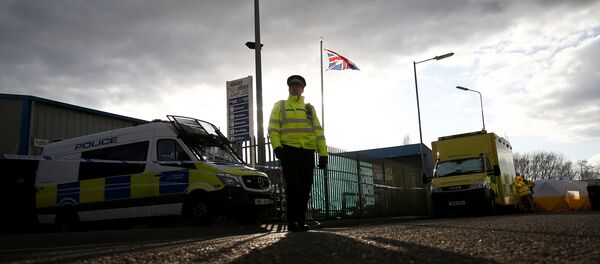 A police officer stands guard at a car recovery depot in Norton Enterprise Park, where Sergei Skripal's car was originally transported, in Salisbury, Britain, March 13, 2018 A police officer stands guard at a car recovery depot in Norton Enterprise Park, where Sergei Skripal's car was originally transported, in Salisbury, Britain, March 13, 2018 - Sputnik International