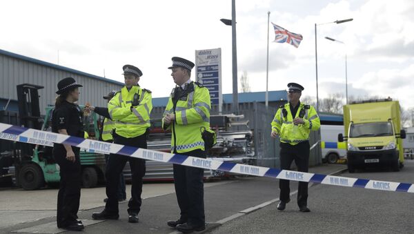 Police officers secure a cordon outside the vehicle recovery business Ashley Wood Recovery in Salisbury, England, Tuesday, March 13, 2018 - Sputnik International