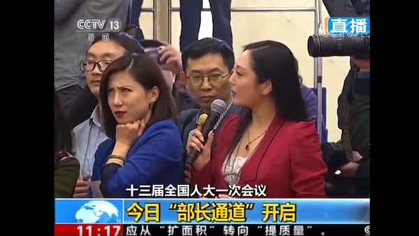 Reporter's Eye Roll at Beijing's Two Sessions Goes Viral - Sputnik International