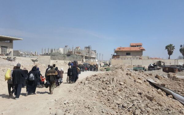 Residents leave the territory of Eastern Ghouta - Sputnik International