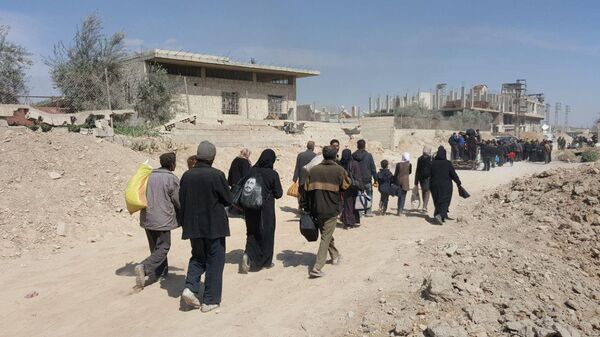 Residents leave the territory of Eastern Ghouta Residents leave the territory of Eastern Ghouta - Sputnik International