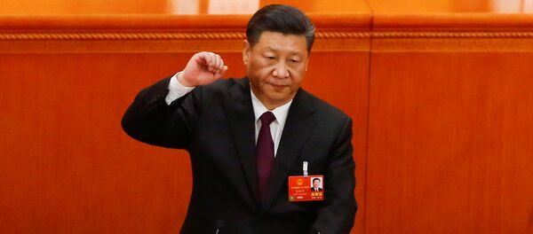 Chinese President Xi Jinping pledges an oath to the Constitution after being confirmed president for another term during the fifth plenary session of the National People's Congress (NPC) at the Great Hall of the People in Beijing, China March 17, 2018 Chinese President Xi Jinping pledges an oath to the Constitution after being confirmed president for another term during the fifth plenary session of the National People's Congress (NPC) at the Great Hall of the People in Beijing, China March 17, 2018 - Sputnik International