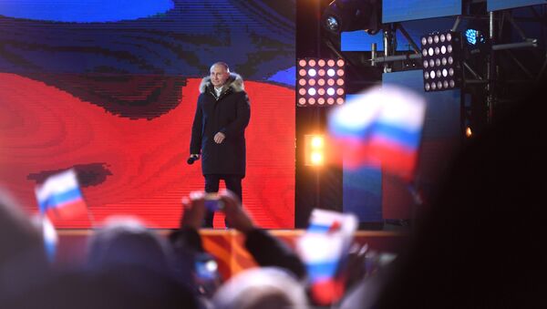 Russian President Vladimir Putin attends the concert and meeting celebrating the first anniversary of Crimea’s reunification with Russia, at Manezhnaya Square in Moscow - Sputnik International