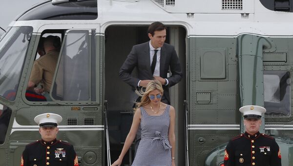 Ivanka Trump and her husband Jared Kushner step off Marine One helicopter and make the walk across the tarmac before boarding Air Force One before President Donald Trump's departure from Andrews Air Force Base. File photo - Sputnik International