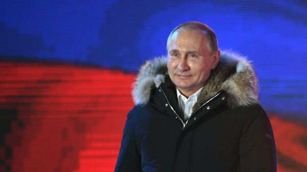 Russian President Vladimir Putin attends the concert and meeting celebrating the first anniversary of Crimea’s reunification with Russia, at Manezhnaya Square in Moscow - Sputnik International