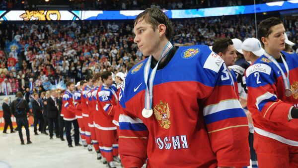 Russia's goalie Alexander Georgiyev with silver medal of the 2016 IIHF Ice Hockey World Junior Championship in Finland - Sputnik International