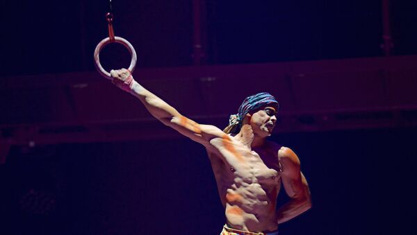 This Sept. 24, 2017, photo provided by Michael Kass shows Yann Arnaud during a Cirque du Soleil performance in Toronto - Sputnik International