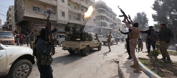 Turkish-backed Free Syrian Army members are celebrating in Afrin, Syria March 18, 2018 - Sputnik International