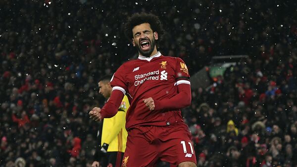 Liverpool's Mohamed Salah celebrates scoring his hat-trick during the English Premier League soccer match between Liverpool and Watford at Anfield, Liverpool, England - Sputnik International