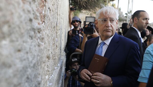 US ambassador to Israel David Friedman visits the Western Wall, the holiest site where Jews can pray, in the old city of Jerusalem on May 15, 2017 - Sputnik International