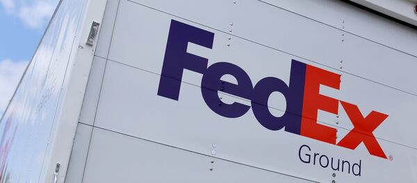 A Federal Express truck is shown on deliver in La Jola, California, U.S., May 17, 2017 A Federal Express truck is shown on deliver in La Jola, California, U.S., May 17, 2017 - Sputnik International