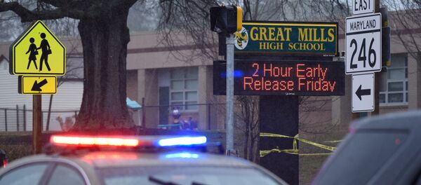 Law enforcement vehicles are seen outside the Great Mills High School following a shooting on Tuesday morning in St. Mary's County, Maryland, U.S., March 20, 2018 Law enforcement vehicles are seen outside the Great Mills High School following a shooting on Tuesday morning in St. Mary's County, Maryland, U.S., March 20, 2018 - Sputnik International
