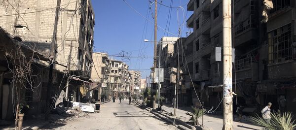 Syrian Army's armored vehicles in the liberated town of Kafr Batna in Eastern Ghouta - Sputnik International