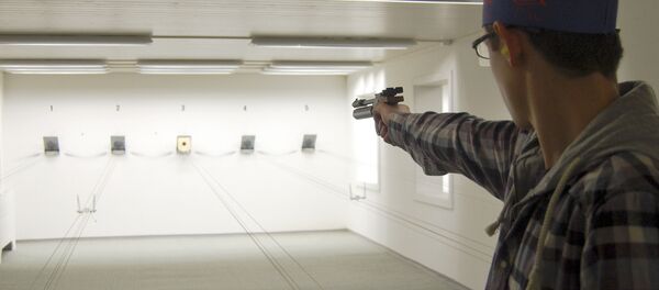 A man trains with a softair pistole on the shooting range of the village's shooting club in Bueren an der Aare near Bern, Switzerland. (File) - Sputnik International