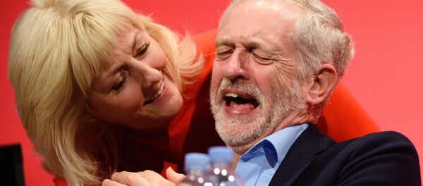 Opposition Labour Party leader Jeremy Corbyn shares a joke with Jennie Formby on day two of the annual Labour party conference in Brighton. (File) Opposition Labour Party leader Jeremy Corbyn shares a joke with Jennie Formby on day two of the annual Labour party conference in Brighton. (File) - Sputnik International
