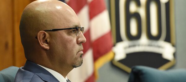 Pico Rivera City Councilman and El Rancho High School teacher Gregory Salcido listens to public remarks during a city council meeting at Pico Rivera City Hall on Tuesday, Feb. 13, 2018, in Pico Rivera, Calif. - Sputnik International