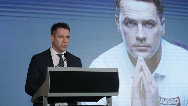 Former British football player Michael Owen speaks during a news conference in Hong Kong. File photo - Sputnik International
