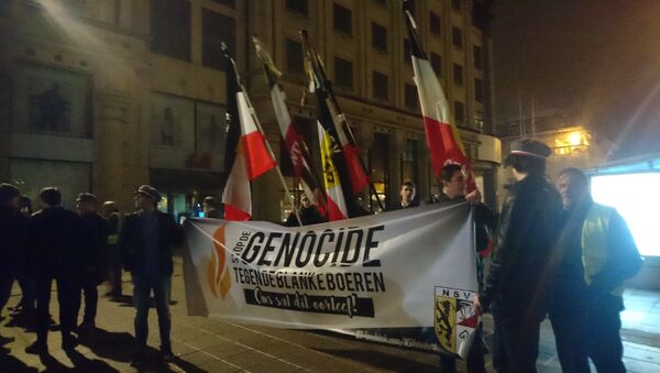 Members of the Belgian Nationalist Student Association organized rally in Ghent against what they call the genocide of white farmers in South Africa - Sputnik International